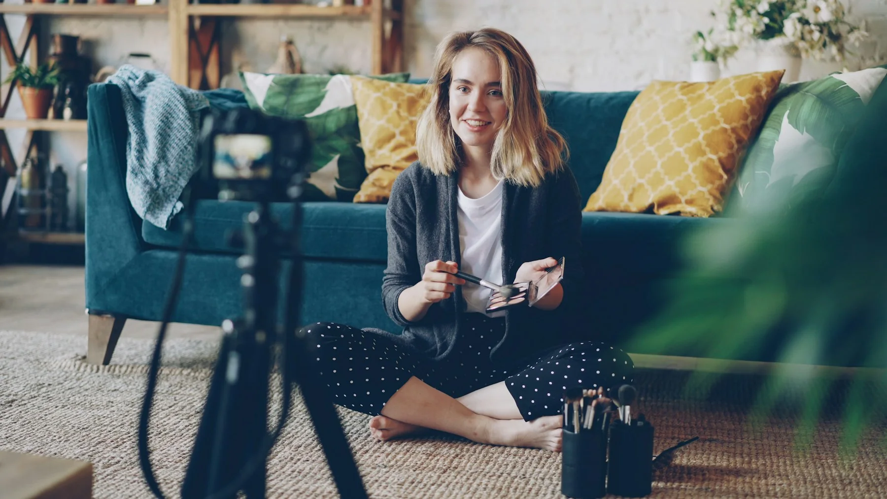Beauty creator presenting a product while filming social content